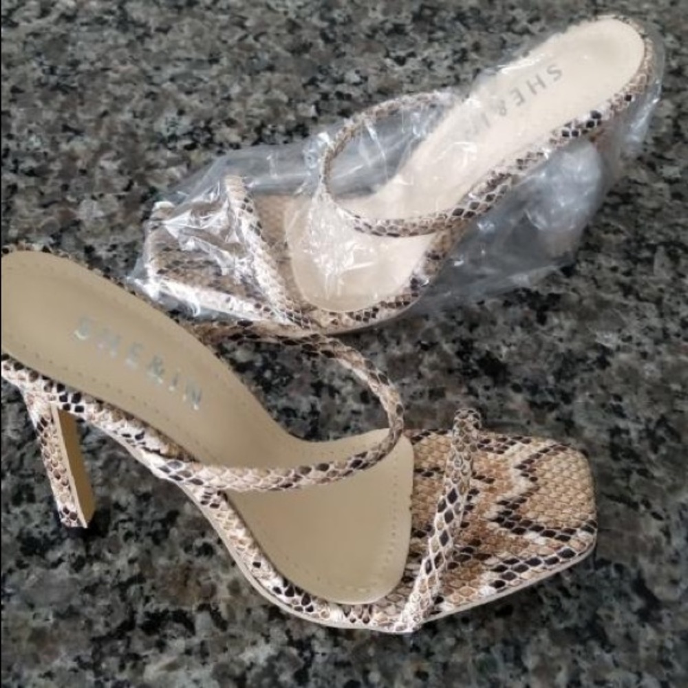 Snake skin mule sandals.